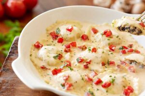 Ravioli di Portobello Alfredo Serrano – Olive Garden México